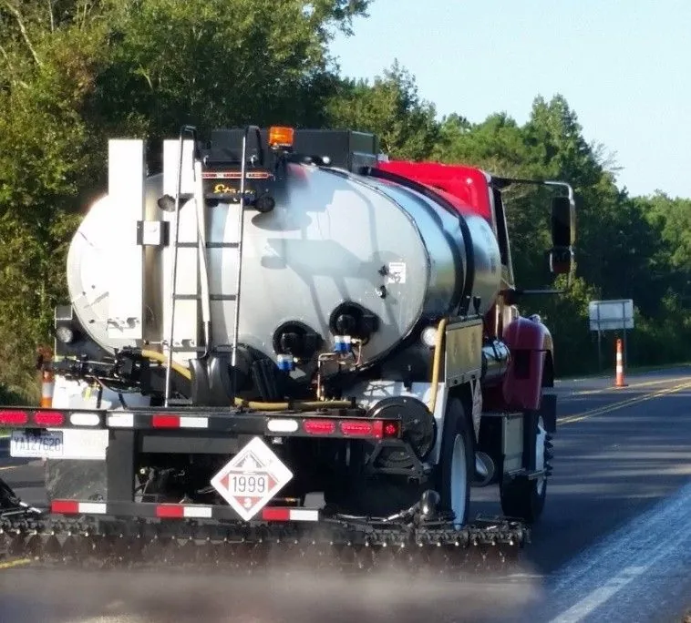 Figure 63. Distributor Applying Tack Coat