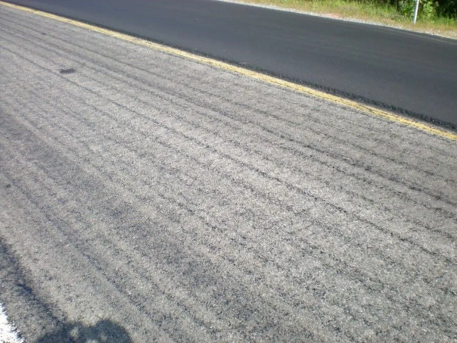 Figure 65. Non-Uniform Application of Tack Coat