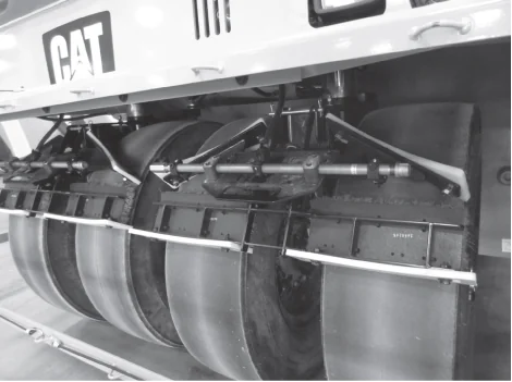 Figure 113. Water-Spray System and Wetting Mats on Pneumatic Tires