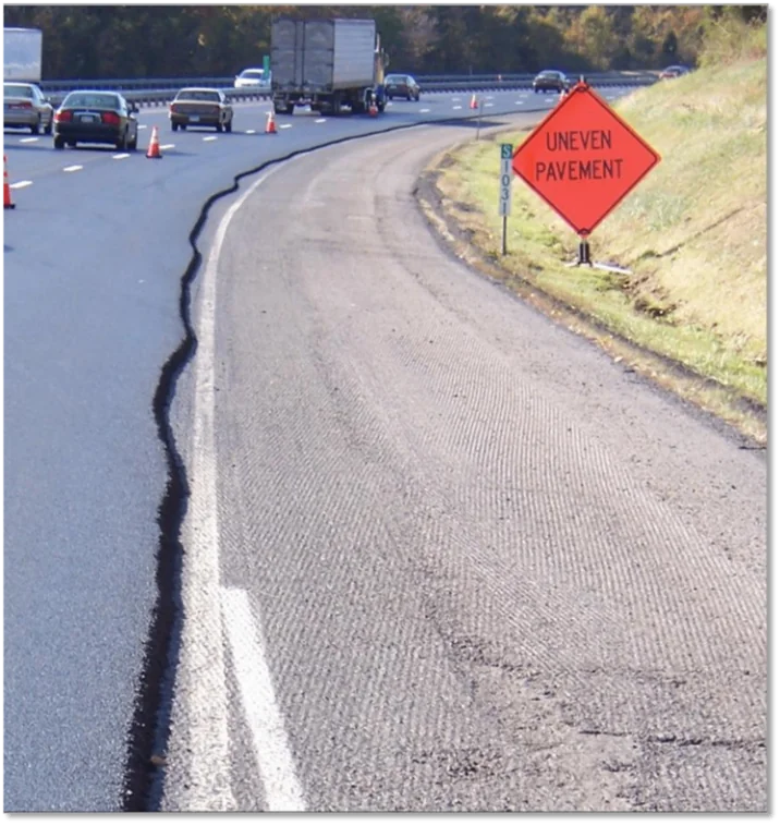 Figure 129. Not Paving Straight (or Smooth on a Curve) Makes It Impossible to Achieve a Consistent Overlay