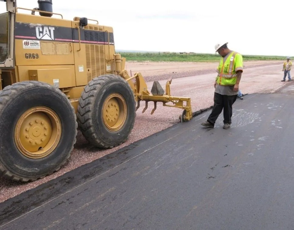 Figure 138. Cutting Wheel Attached to Rear Ripper of a Grader