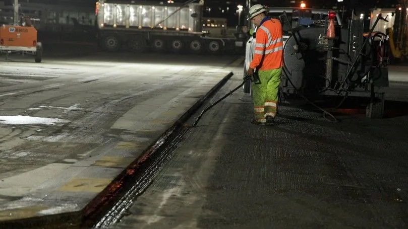 Figure 142. Joint Adhesive Being Applied to the Cold Joint Face